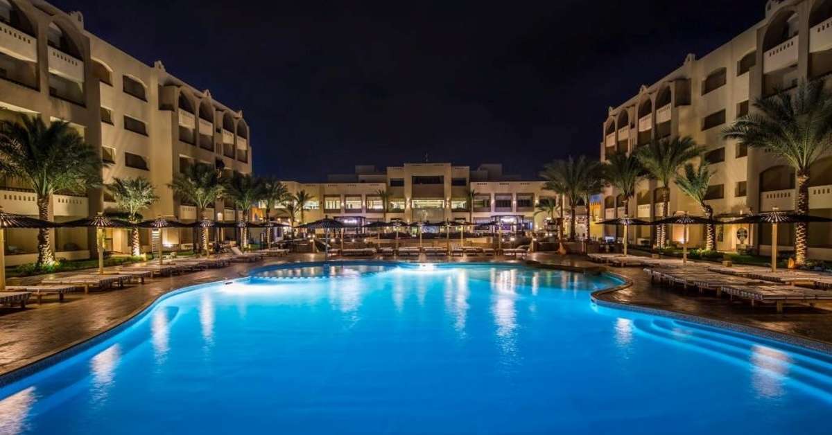 Een foto van het zwembad bij El Karma Aqua Beach Resort