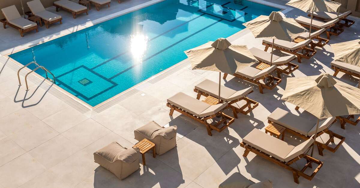 Een foto van het zwembad bij Nicolas Grand Suites
