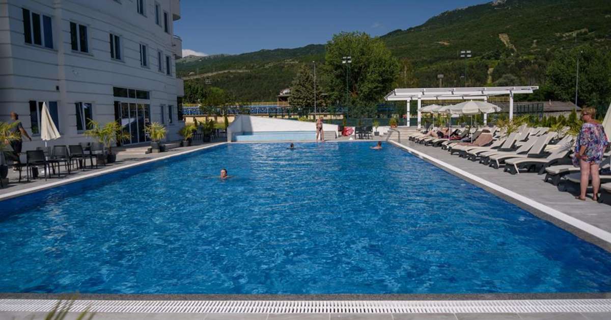 Een foto van het zwembad bij Unique Resort & Spa