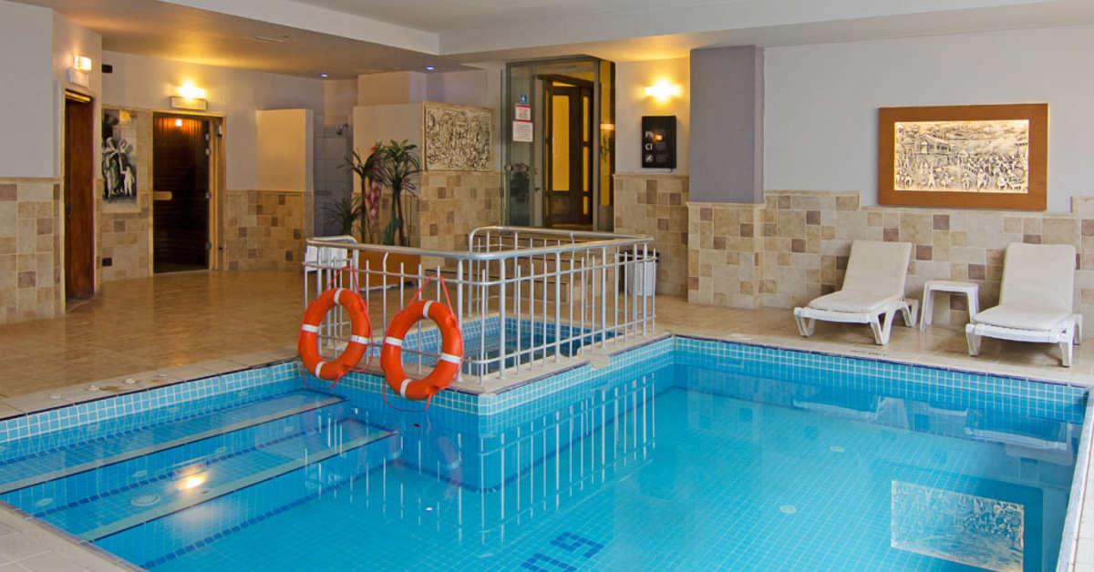 Een foto van het zwembad bij Garden of Sun Hotel