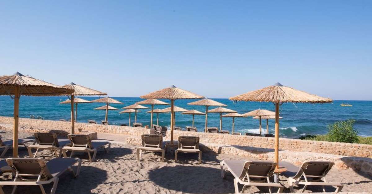 Een foto van het strand bij Hotel Cactus Bay