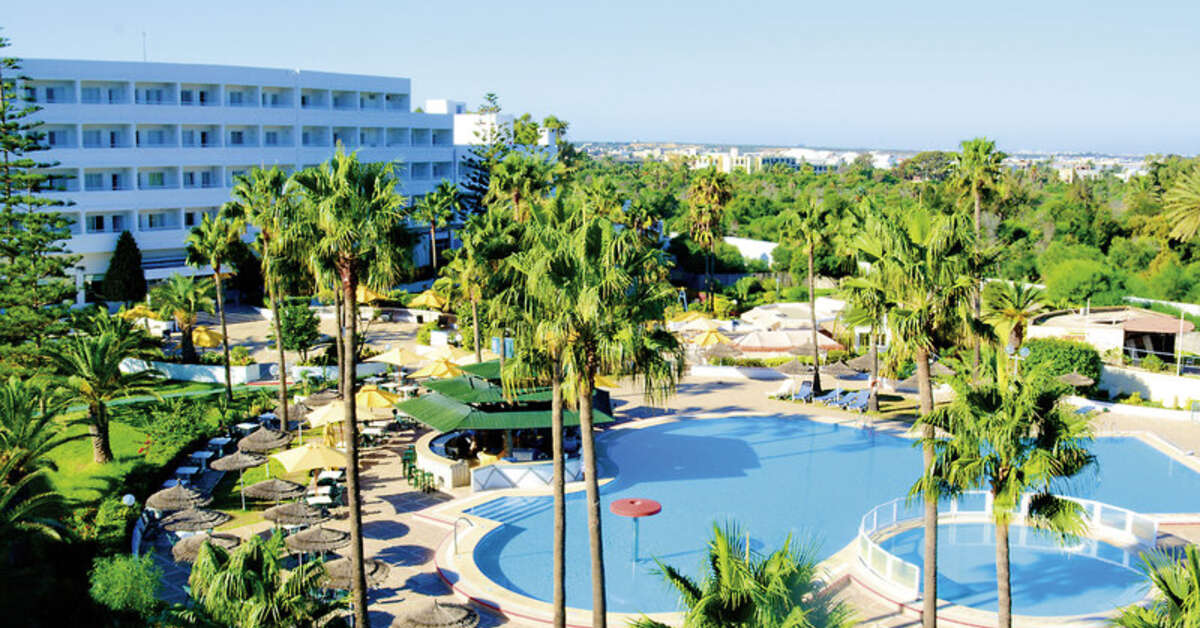 Een foto van het zwembad bij Hotel Club Tropicana & Spa