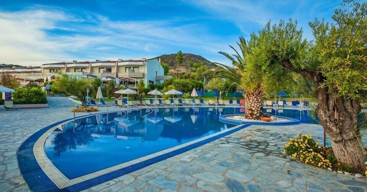 Een foto van het zwembad bij Xenios Anastasia Resort & Spa