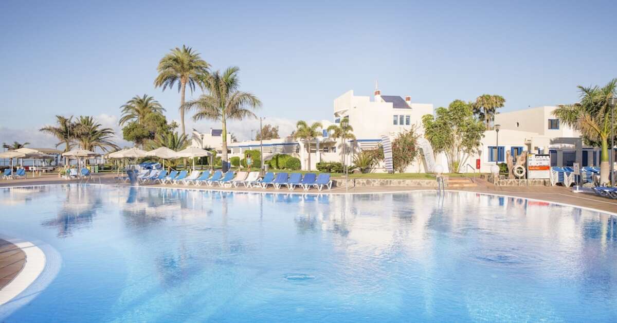 Een foto van het zwembad bij Playa Feliz