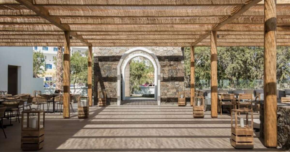 Een foto van het terras bij Mitsis Norida Beach Hotel