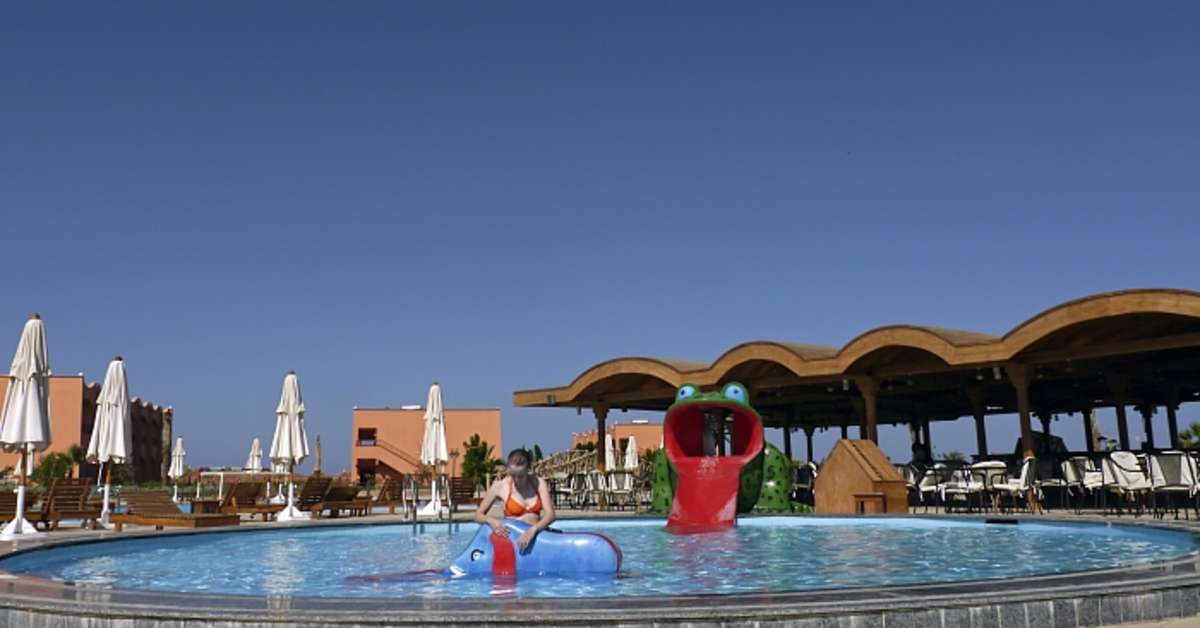 Een foto van het zwembad bij Happy Life Village