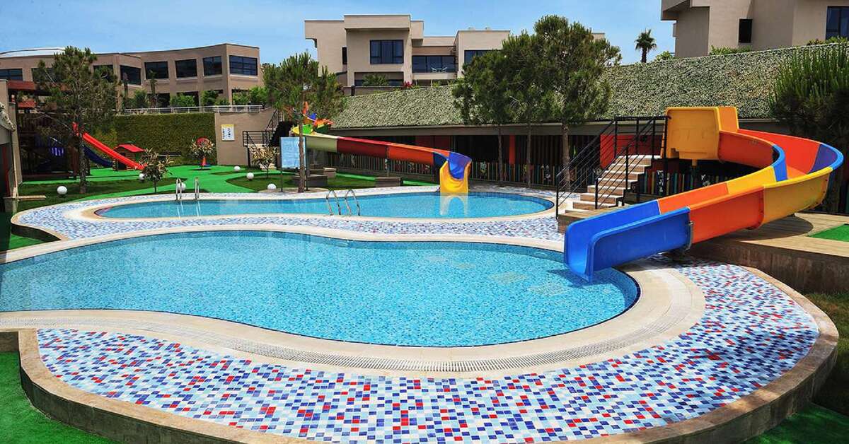 Een foto van het zwembad bij Susesi Luxury Resort