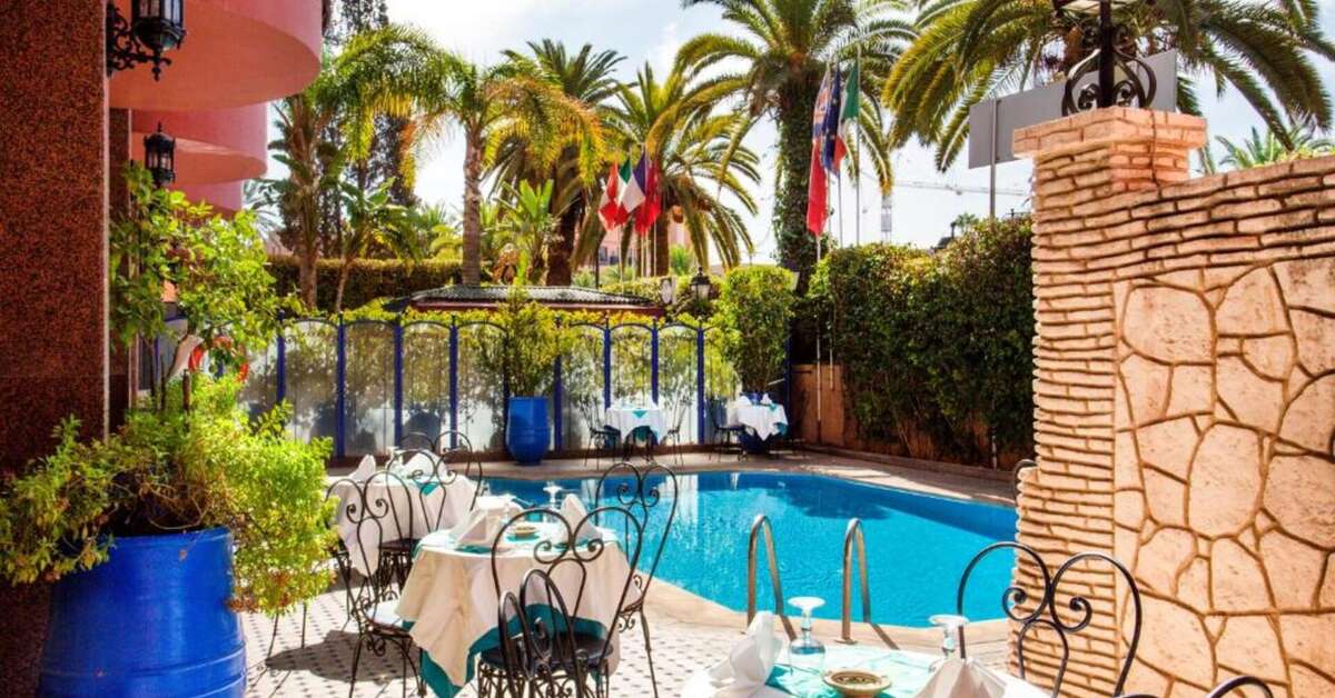 Een foto van het zwembad bij Hotel Akabar