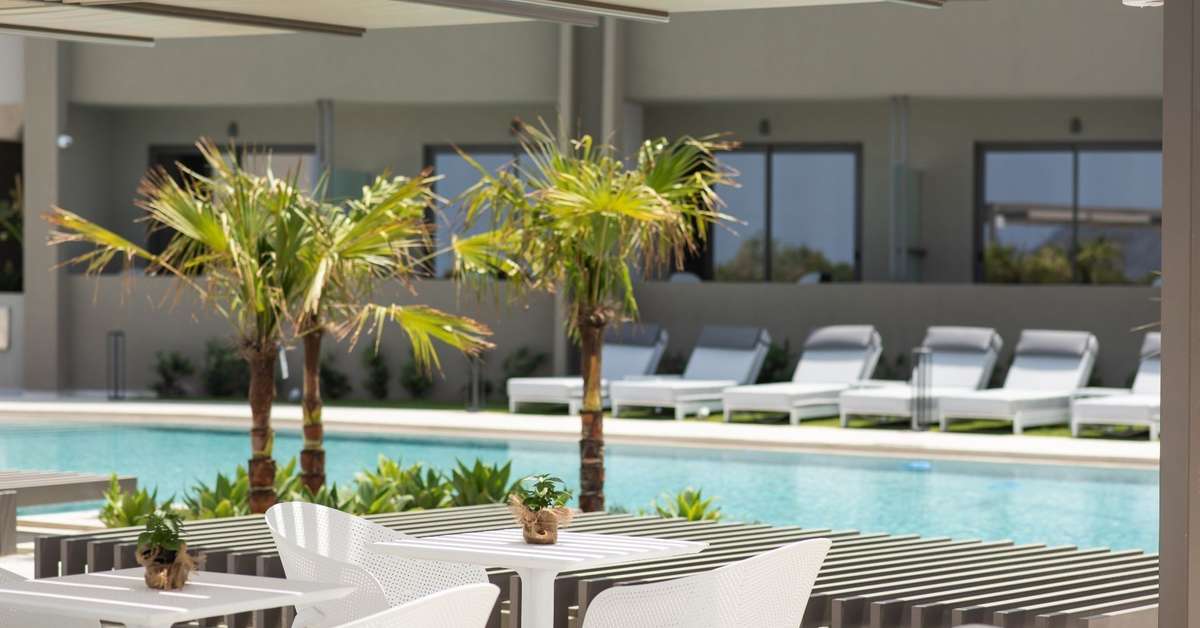 Ein Foto vom Pool im Amalthia Beach Resort