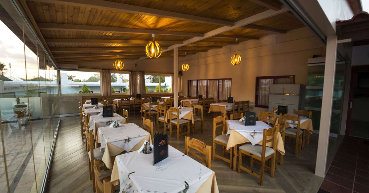 Een foto van de faciliteiten bij Sandy's Studios & Log Villas