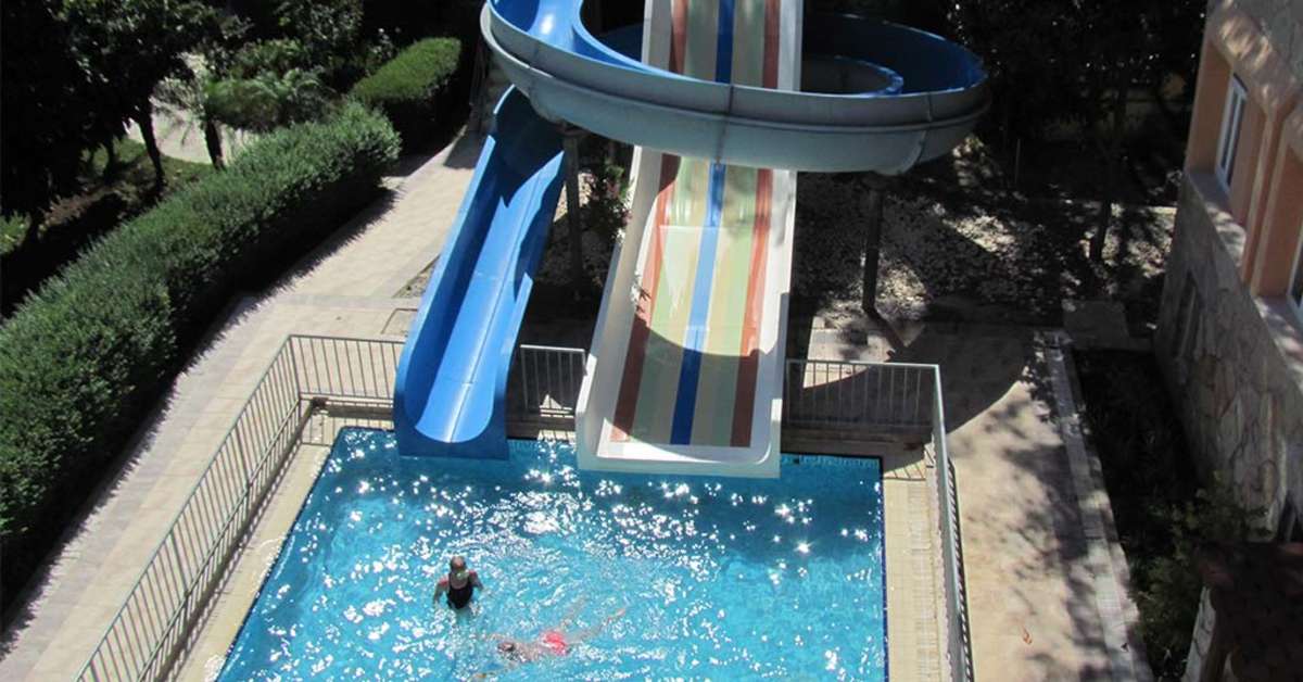 Een foto van het zwembad bij Side Village Family Suite Hotel