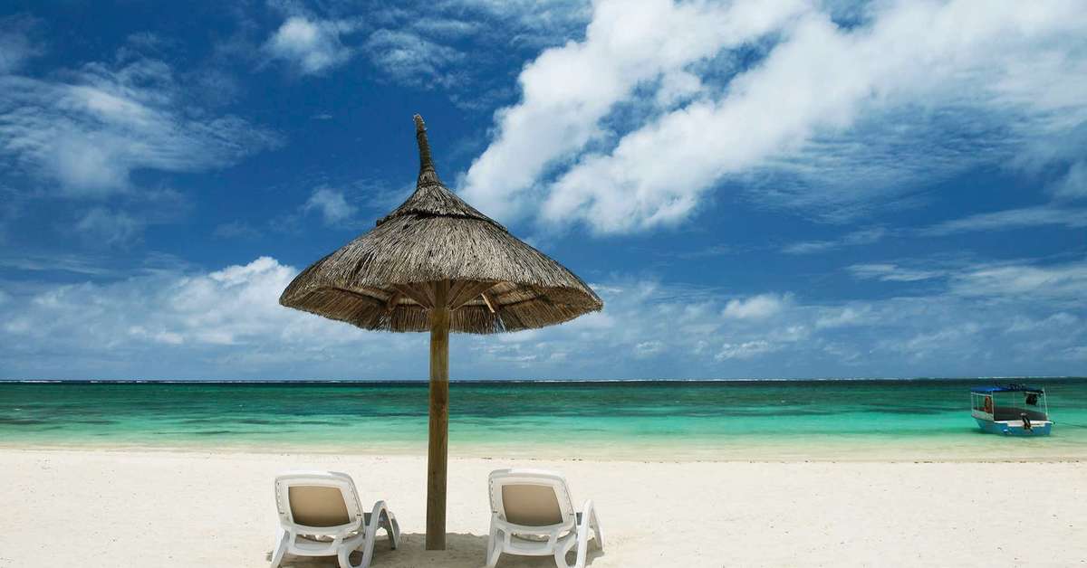 Ein Foto vom Strand beim Sunrise Attitude