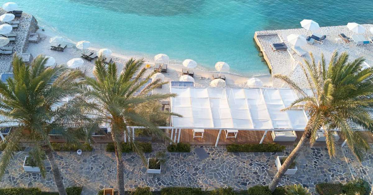 Een foto van het strand bij Minos Imperial Luxury Beach Resort & Spa