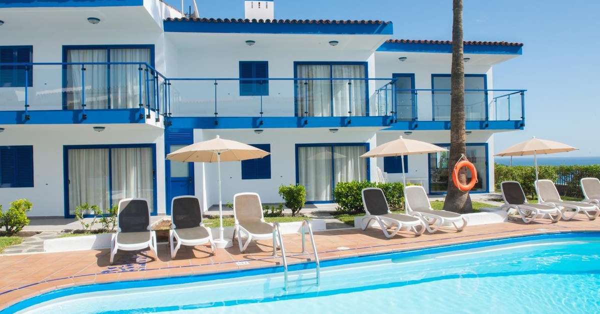Een foto van het zwembad bij Appartementen Los Caribes I