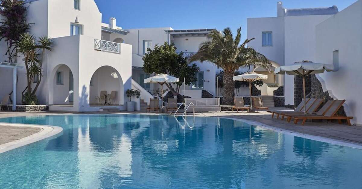 Een foto van het zwembad bij El Greco Resort & Spa
