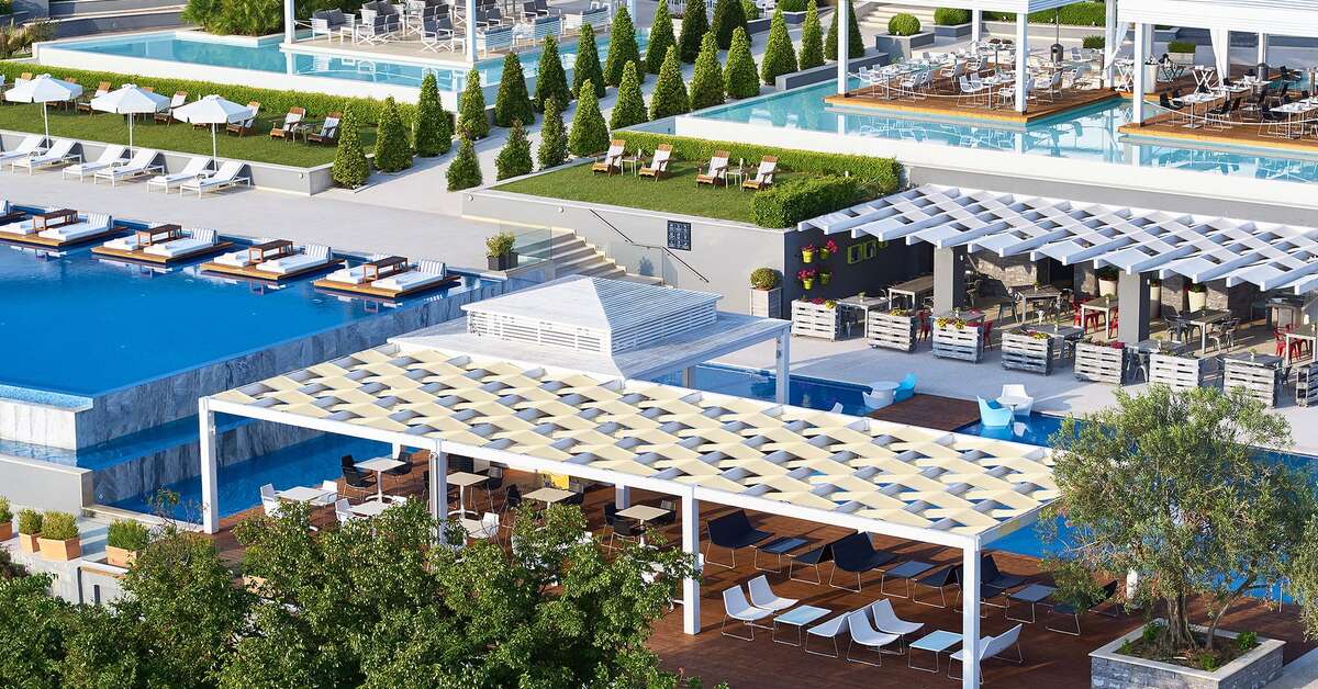 Een foto van het zwembad bij Cavo Olympo Luxury Hotel & Spa
