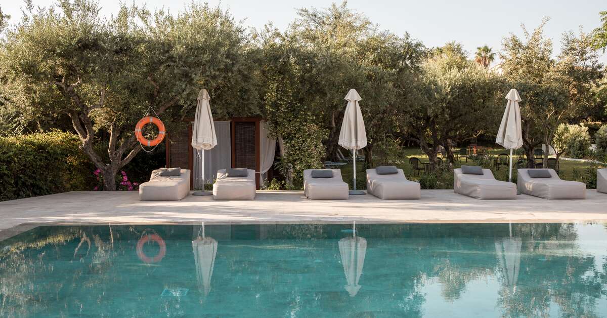 Een foto van het zwembad bij Castelli Hotel