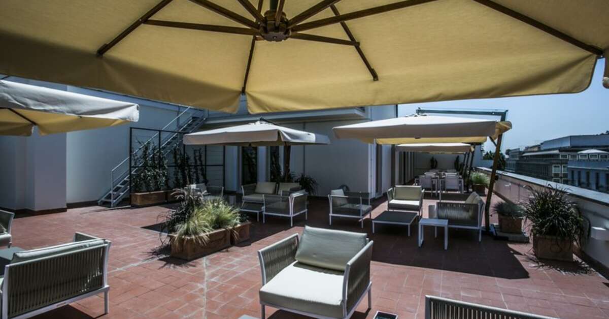 Een foto van het terras bij Rome Glam Hotel