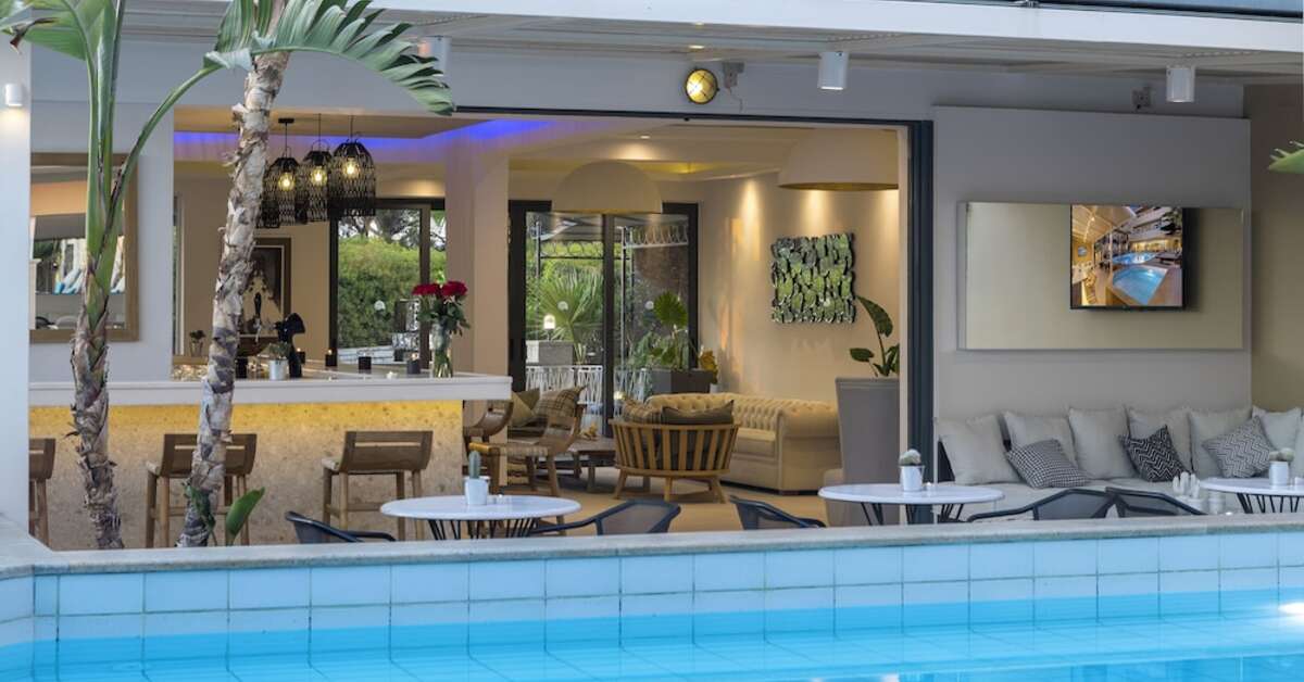 Een foto van het zwembad bij La Stella Appartementen & Suites