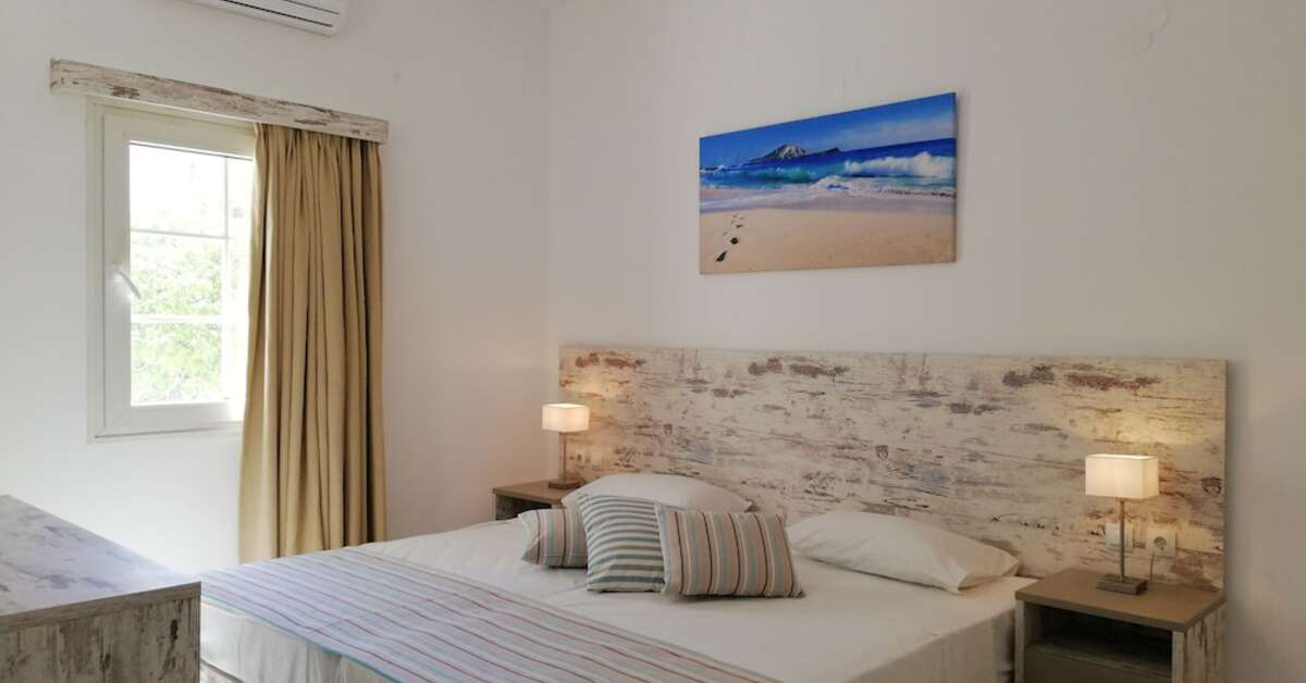 Ein Foto Evina Rooms & Villas