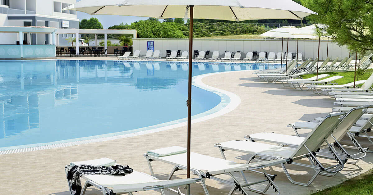 Een foto van het zwembad bij Evita Resort