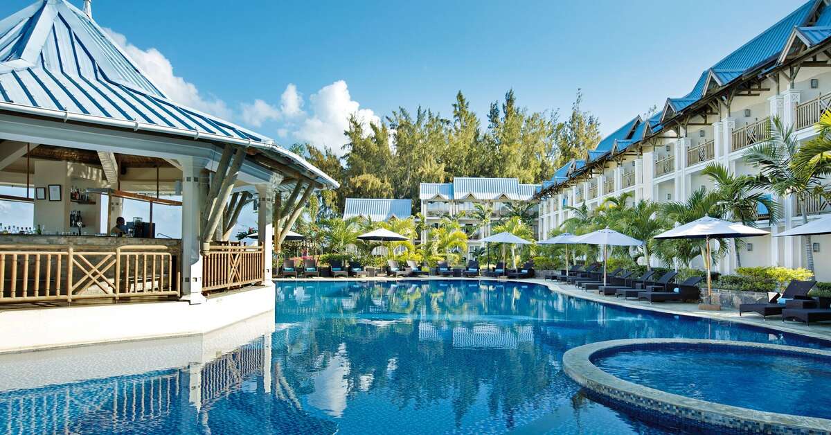 Een foto van het zwembad bij Pearle Beach Resort & Spa