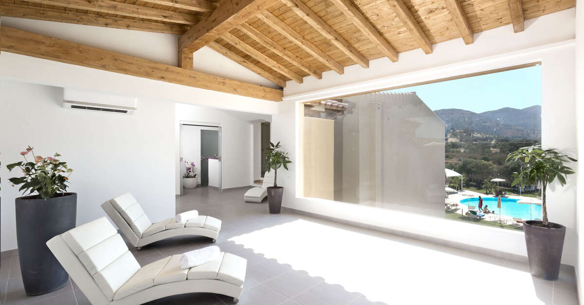 Een foto van het interieur van San Teodoro Hotel