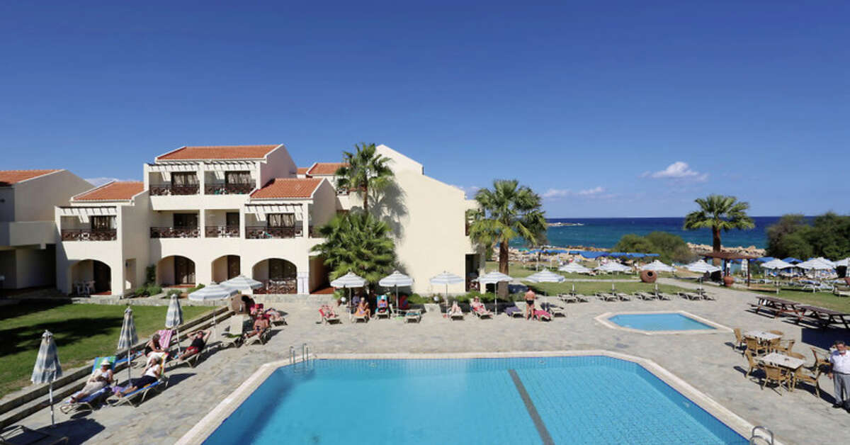 Een foto van het zwembad bij Hotel Mimosa Beach