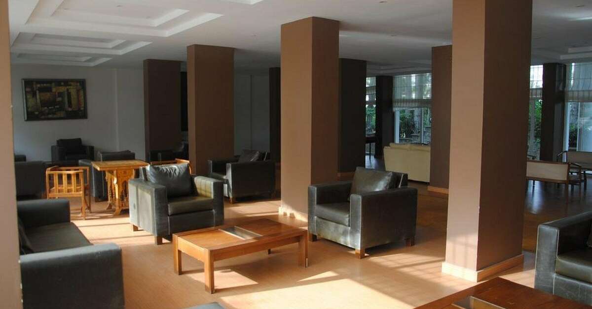 Een foto van het interieur van Hotel Flora Suites