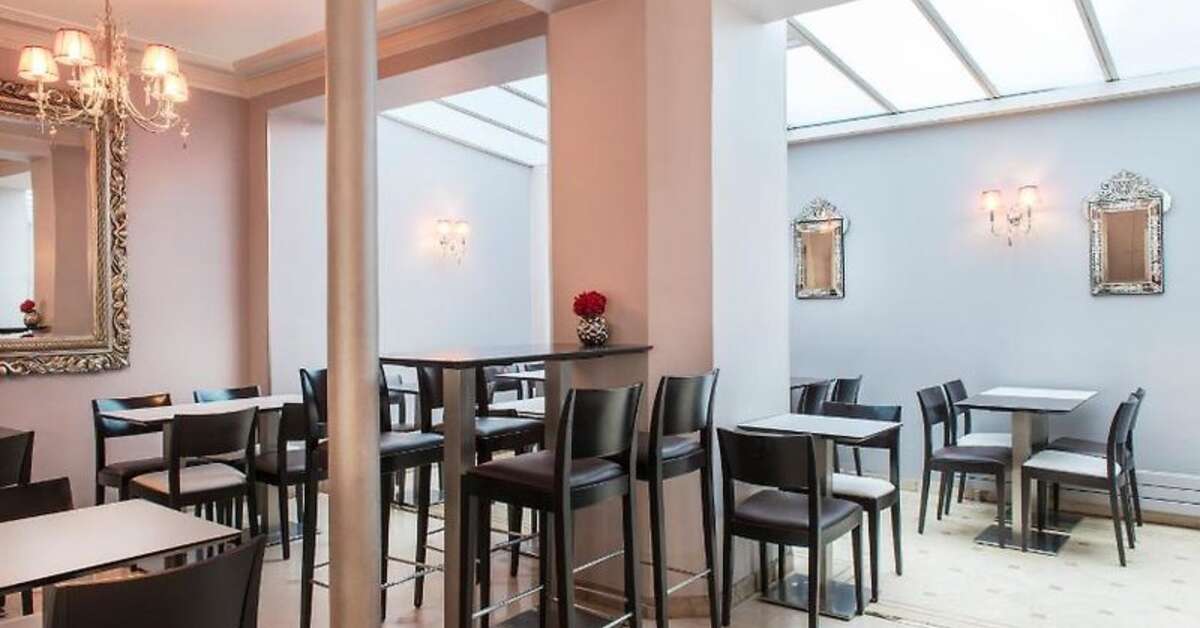 Een foto van het interieur van Hotel Corona Rodier