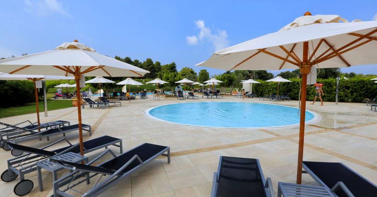 Een foto van het zwembad bij Vivosa Apulia Resort
