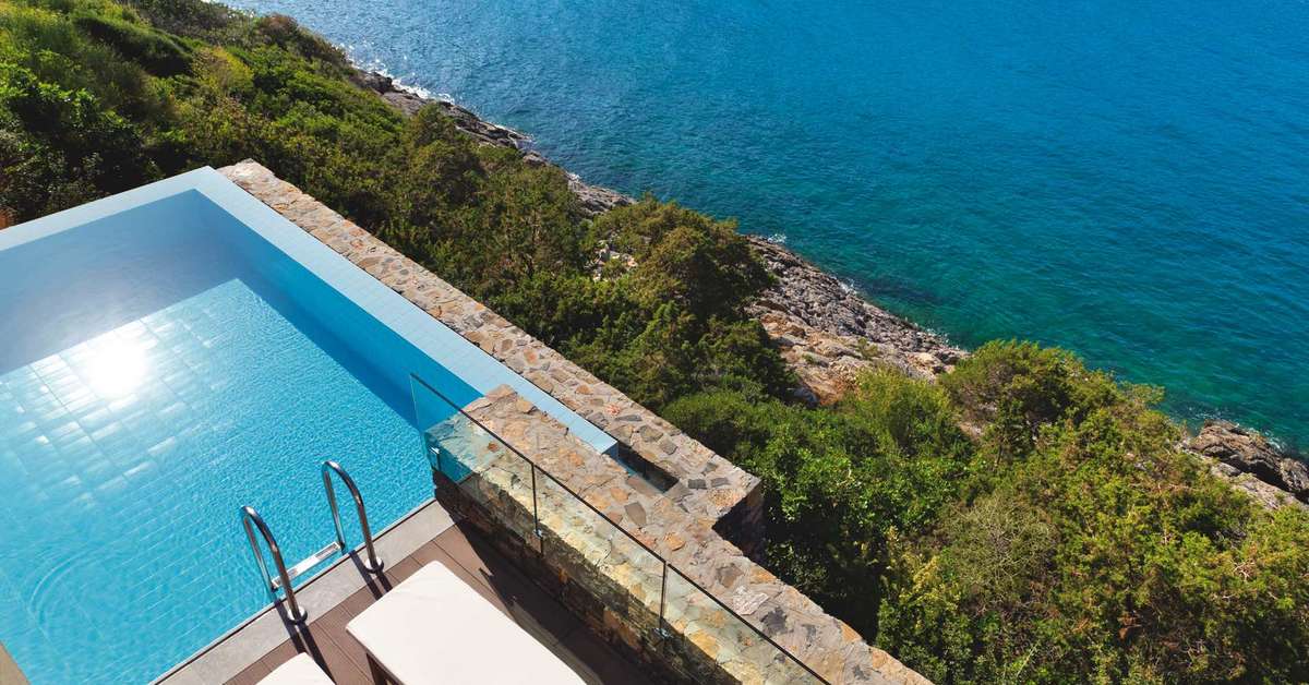 Een foto van het zwembad bij Daios Cove Luxury Resort & Villas