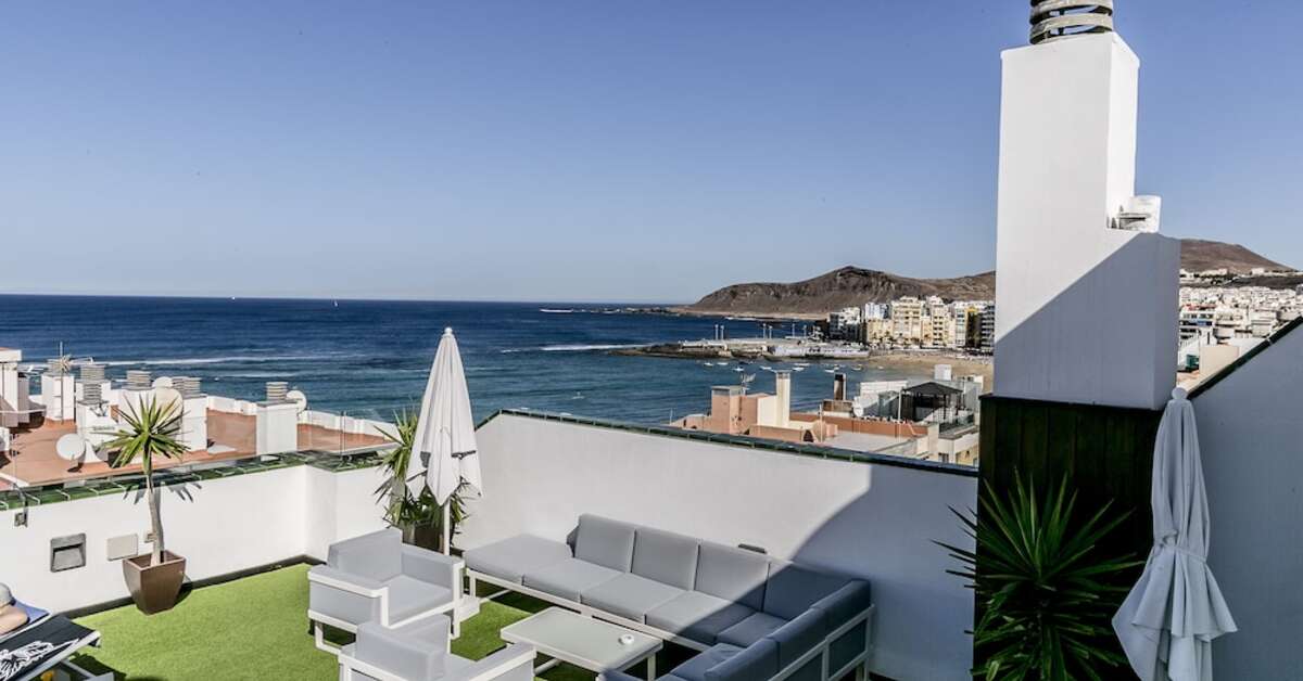 Een foto van het terras bij Exe Las Palmas