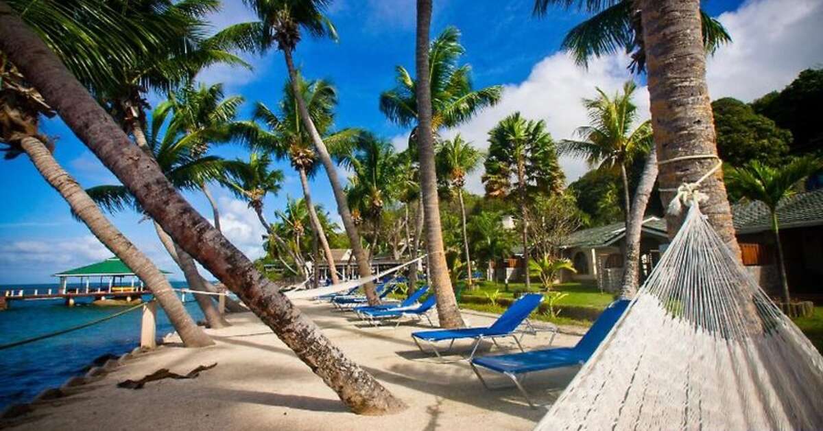 Een foto van het strand bij Coco de Mer & Black Parrot Suites