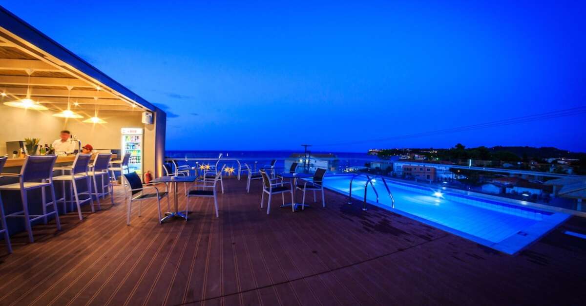 Ein Foto vom Pool im Porto Planos Beach Hotel