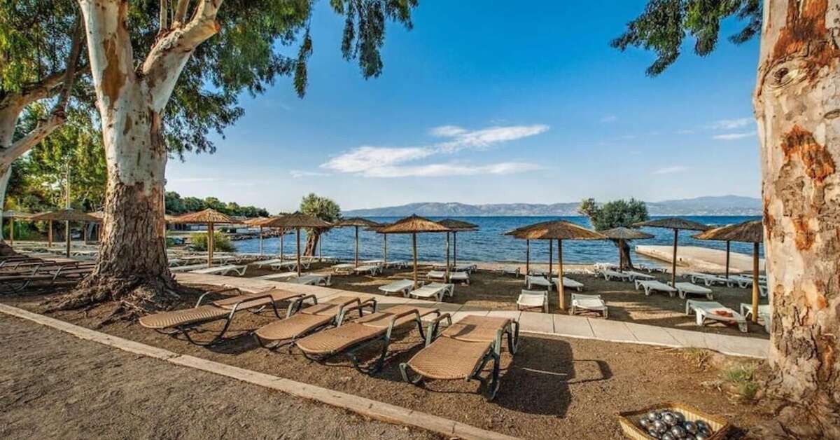 Een foto van het strand bij Evia Riviera Resort