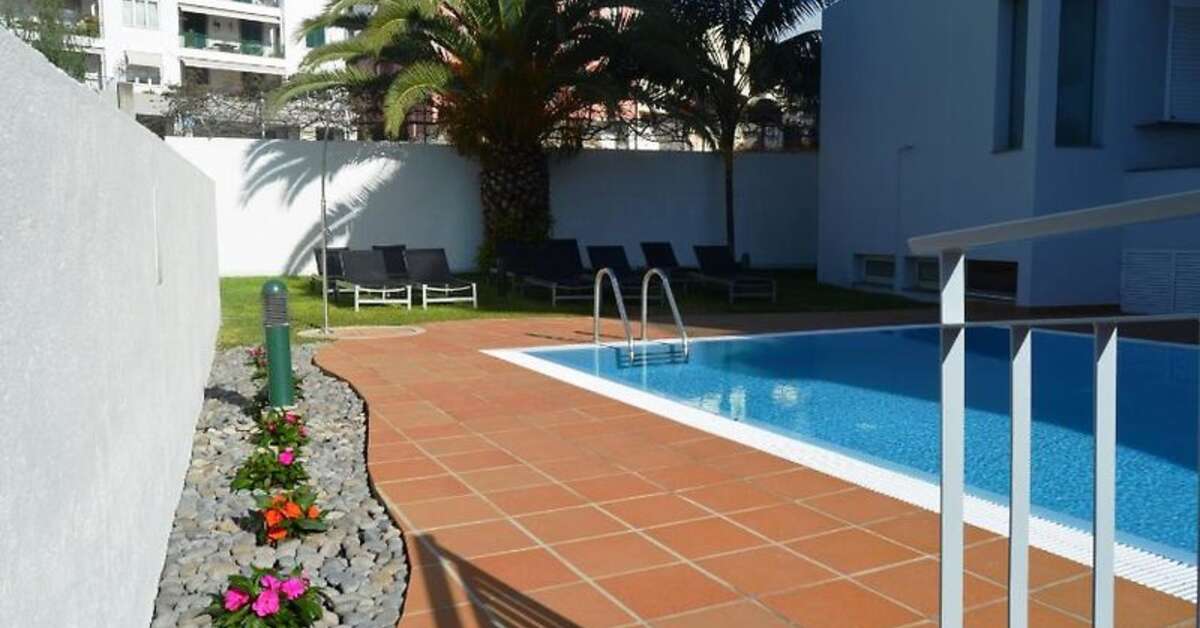 Een foto van het zwembad bij Madeira Bright Star Hotel