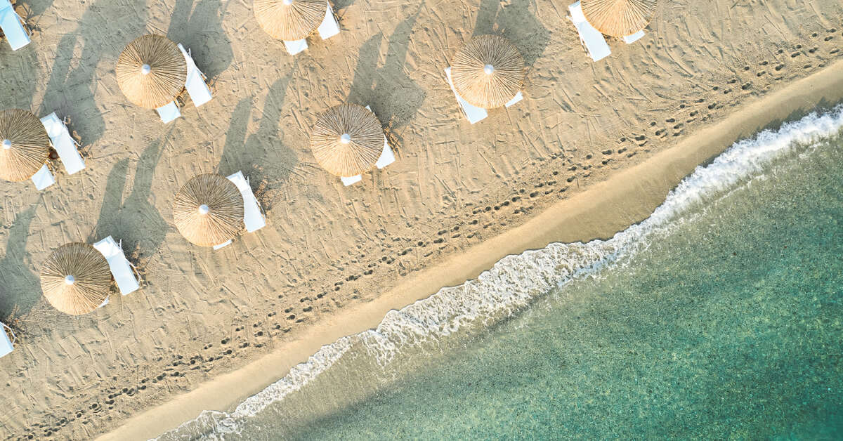 Ein Foto vom Strand beim Grecotel Plaza Beach House