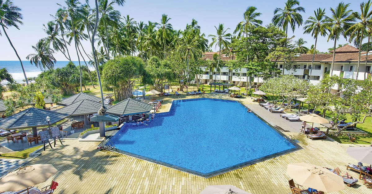 Een foto van het zwembad bij Tangerine Beach Hotel