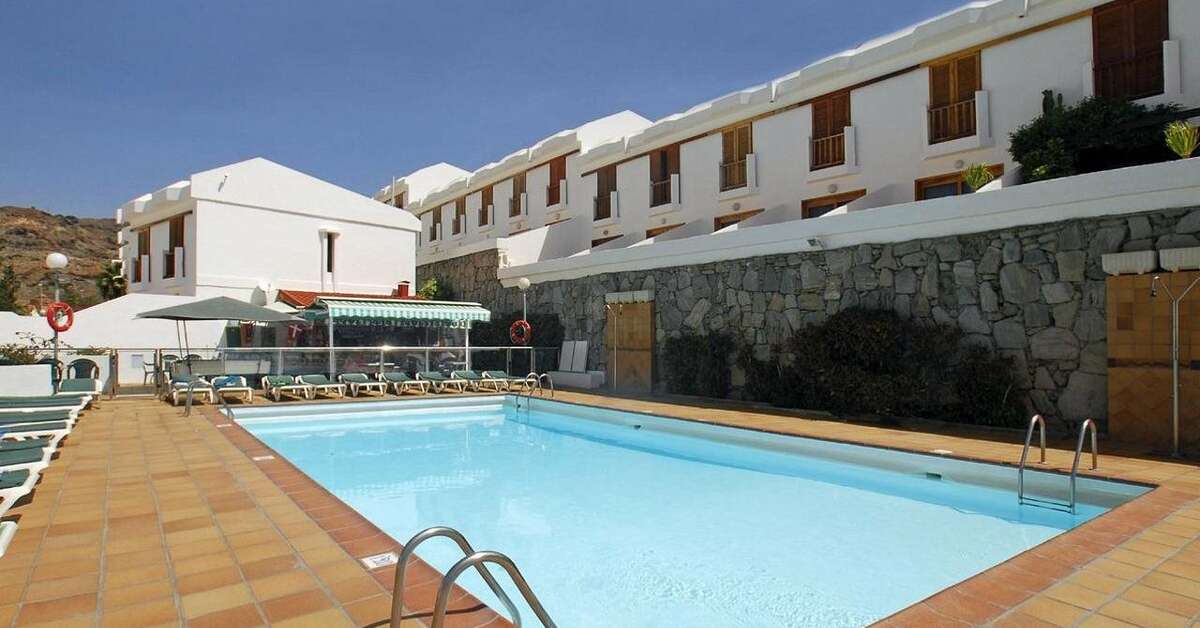 Een foto van het zwembad bij Montecarlo Appartementen