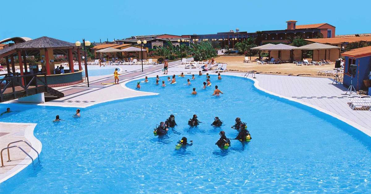 Een foto van het zwembad bij VOI Vila Do Farol Resort