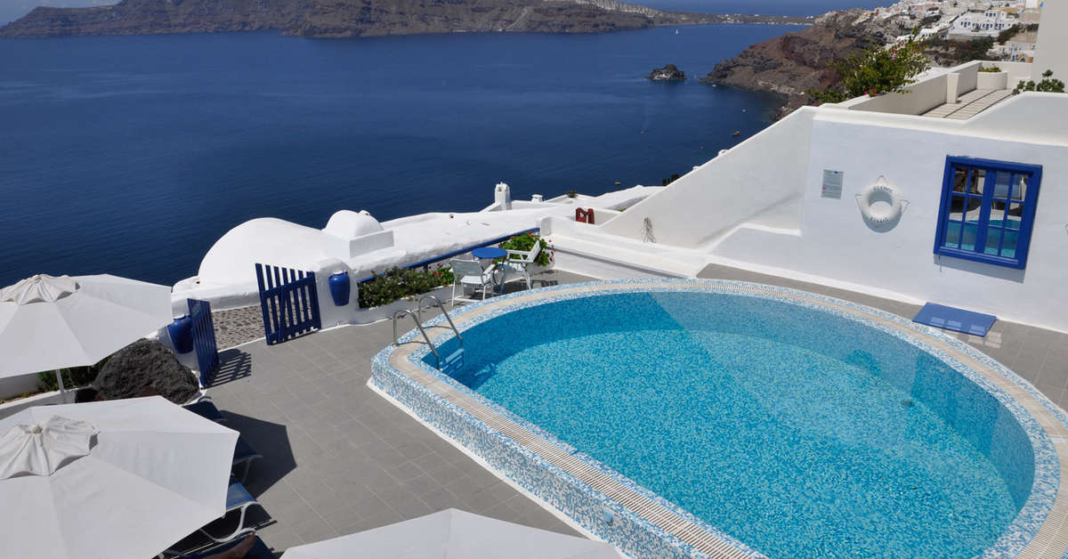 Een foto van het zwembad bij Olympic Villas