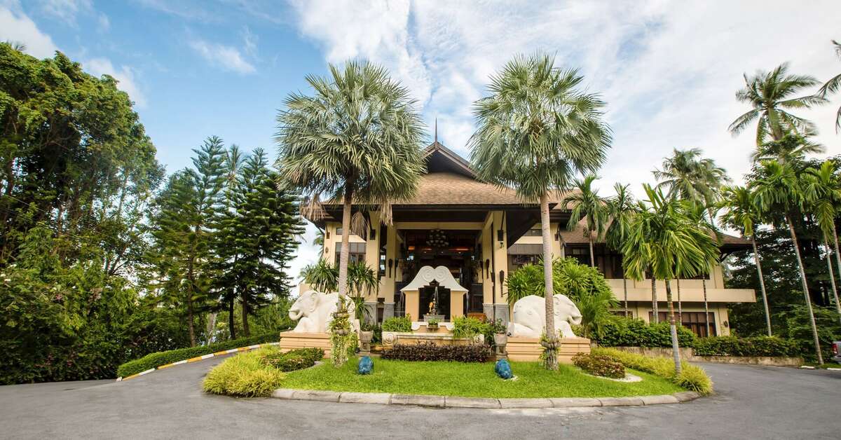 Een foto van de buitenkant van The Fair House Beach Resort