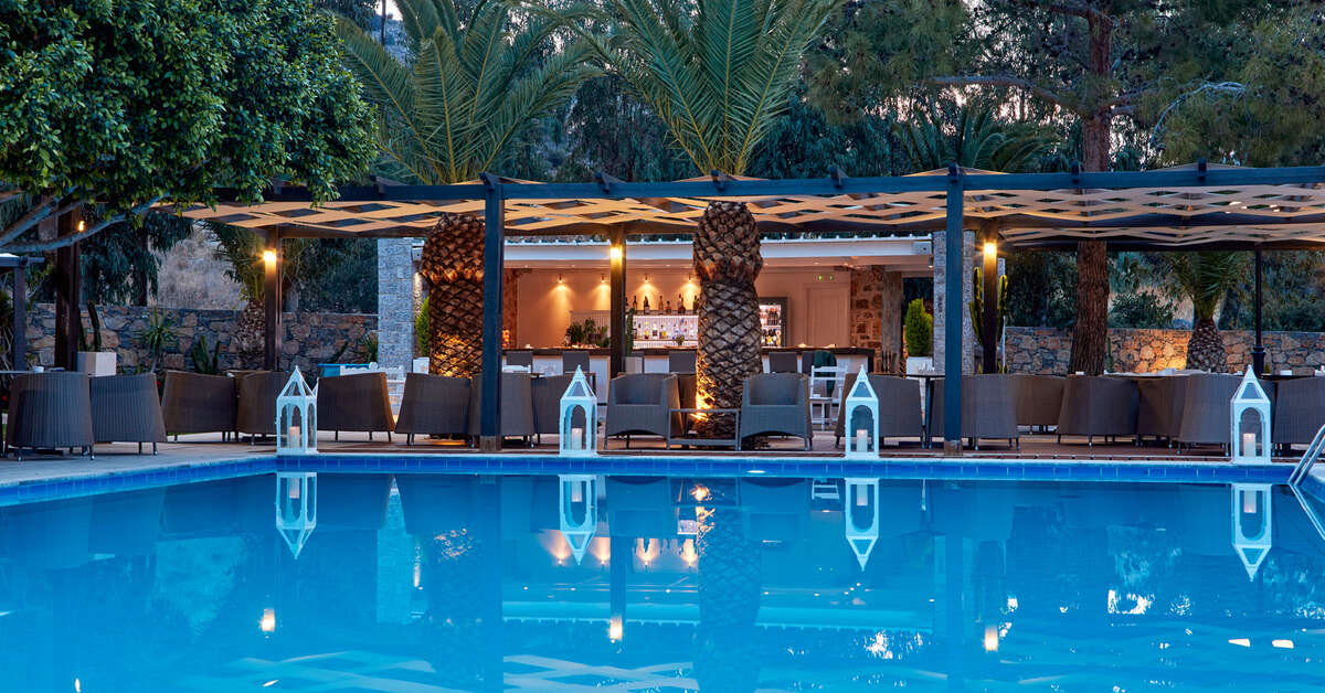 Een foto van het zwembad bij Elounda Palm Hotel & Suites