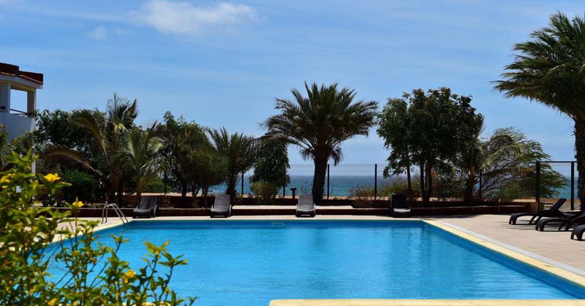 Een foto van het zwembad bij Pestana Tropico