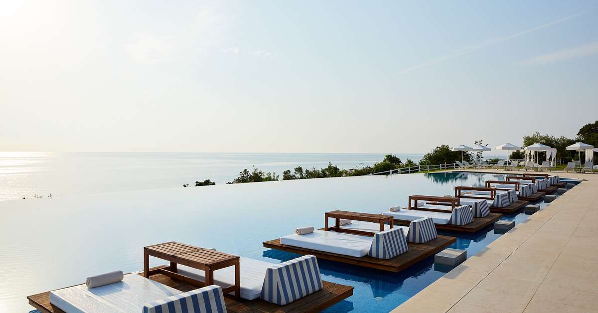 Een foto van het zwembad bij Cavo Olympo Luxury Hotel & Spa
