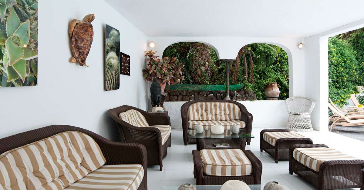 Een foto van het terras bij Hotel Rural Cortijo San Ignacio Golf