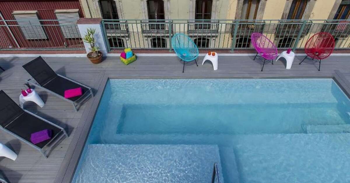 Een foto van het zwembad bij Leonardo Hotel Barcelona Las Ramblas