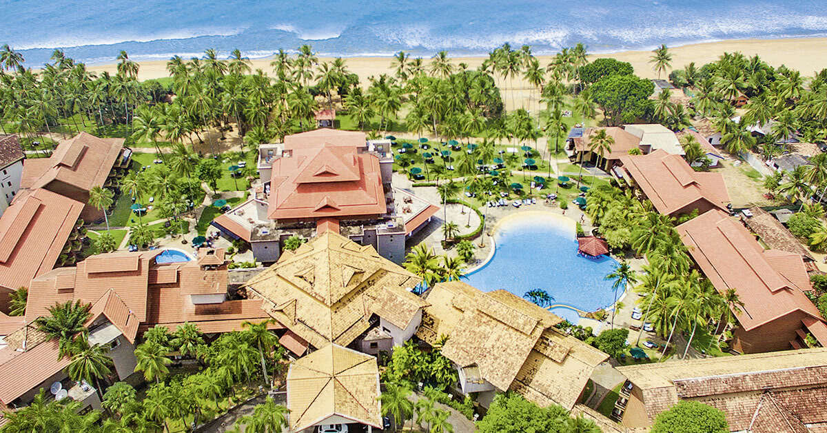 Een foto van het zwembad bij Royal Palms Beach Resort