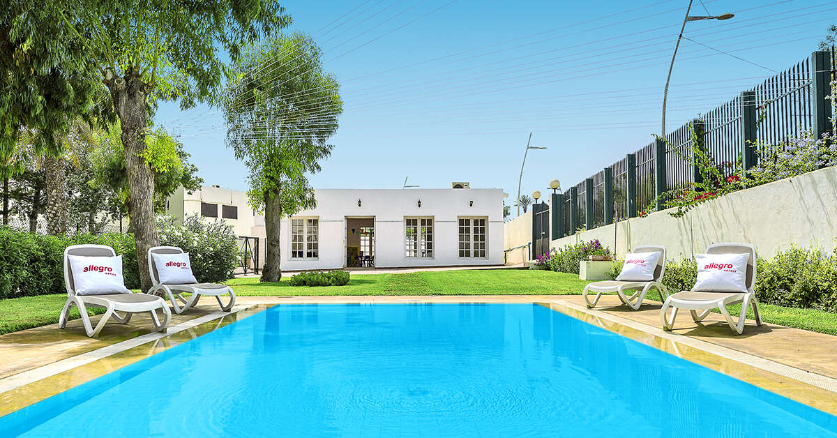Een foto van het zwembad bij Allegro Agadir